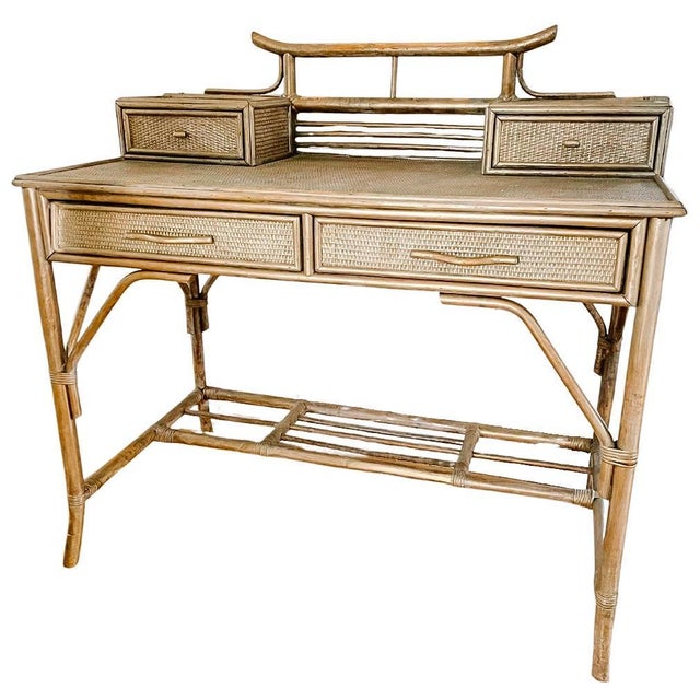 A striking 1960s mid-century writing desk and matching chair in the highly coveted Chinoiserie aesthetic. Set features a...