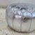 Bring a refined Moroccan touch to your space with this beautifully handcrafted leather pouf cover, made by skilled...