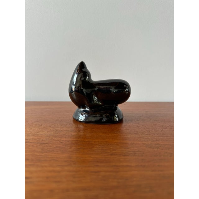 This is a miniature reproduction of the bronze sea lion statue on the waterfront in Sausalito, California. Original statue...