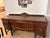 One of a kind antique Jacobean china cabinet from the 1920s. Solid, walnut well-crafted piece with timeless character-...