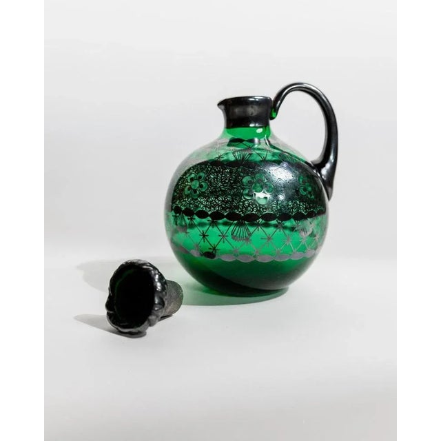 This rare vintage Murano glass liqueur set from 1930s Italy is a stunning example of Venetian glass artistry. The set...