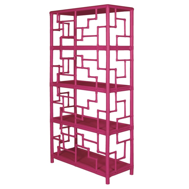 Elegantly designed, this étagère features a rattan frame, rawhide bindings and four wood shelves. The intricate rattan...