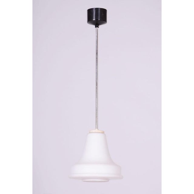 This elegant pendant chandelier, originating from the 1960s from Czechoslovak production, represents an exemplary piece in...