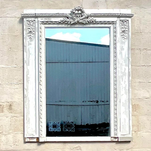 Add a touch of rustic elegance to your home with the Vintage Boho Distressed Hand Carved Mirror. This American-style piece...