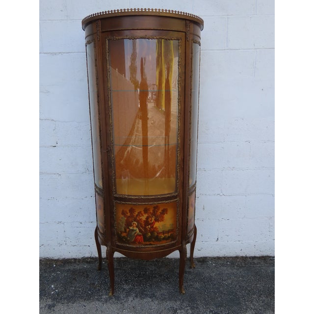 This beautiful Display Cabinet is made of wood, veneer, metal, and glass. The Cabinet has excellent elegant French design,...