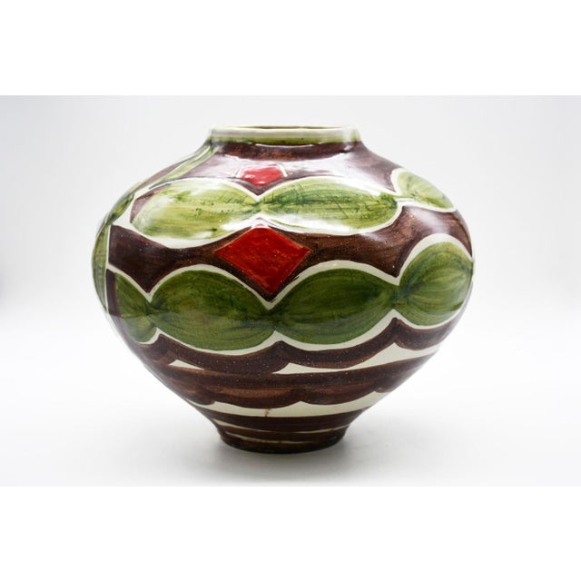 BOCCIA VASE with decorations and colors reminiscent of Mediterranean tradition. Signed by Maker
