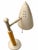 Striking Mid-Century Modern hardwood table lamp featuring a sculptural silhouette and distinctive conical-shaped shade....