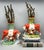 Incredible and rare pair of large Staffordshire pottery spill vases, each depicting a red-and-white cow with a nursing...