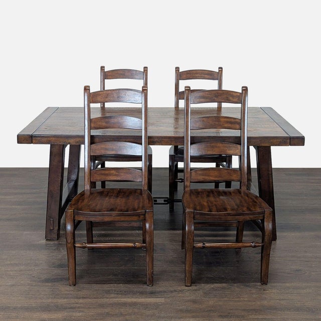 This Pottery Barn dining table features a sturdy wood construction with a warm, rustic finish. The extendable design makes...