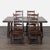 This Pottery Barn dining table features a sturdy wood construction with a warm, rustic finish. The extendable design makes...