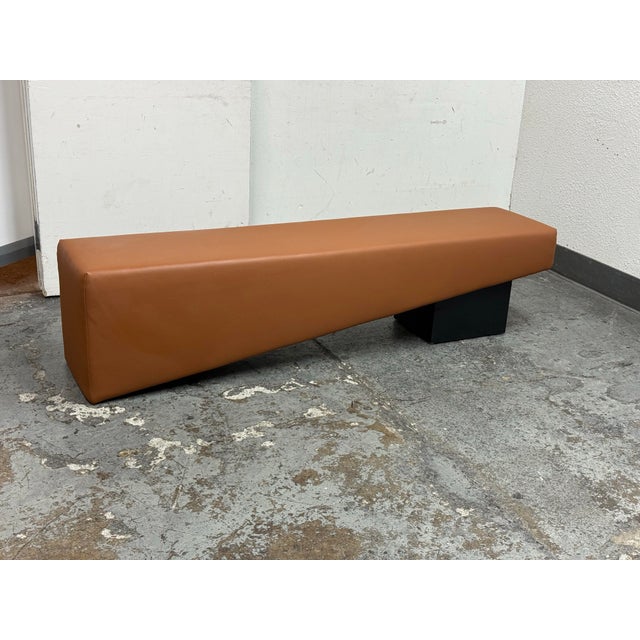 Design Plus Gallery presents a Bench from Michael Oren Designs. This elongated bench has a look of a saddle-horse with its...