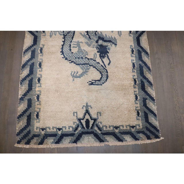 An early 20th-century Mongolian Dragon Design Rug Details rug no. j4587 size 3' 6" x 5' 7" (107 x 170 cm)