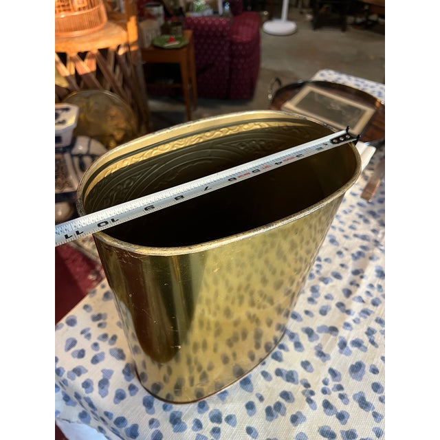 Up for consideration is a beautiful vintage gold world map wastebasket with teal accents. This would look lovely in your...