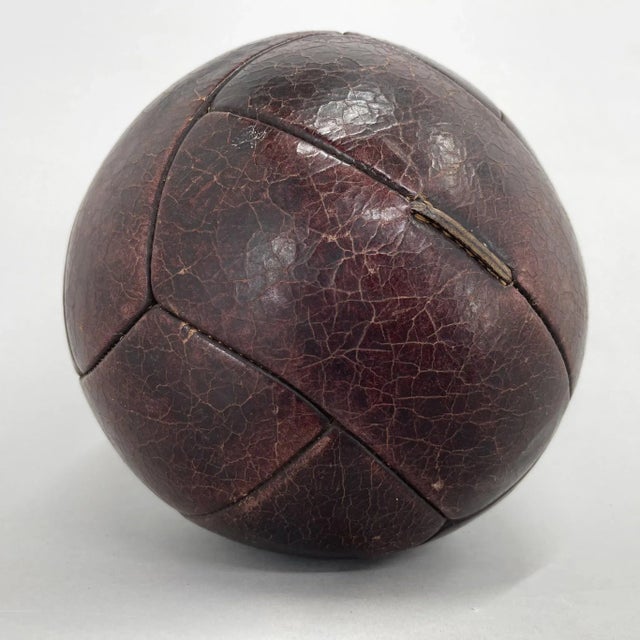 Original vintage heavy leather training ball with beautiful patina. The ball is made of handstitched genuine leather in...