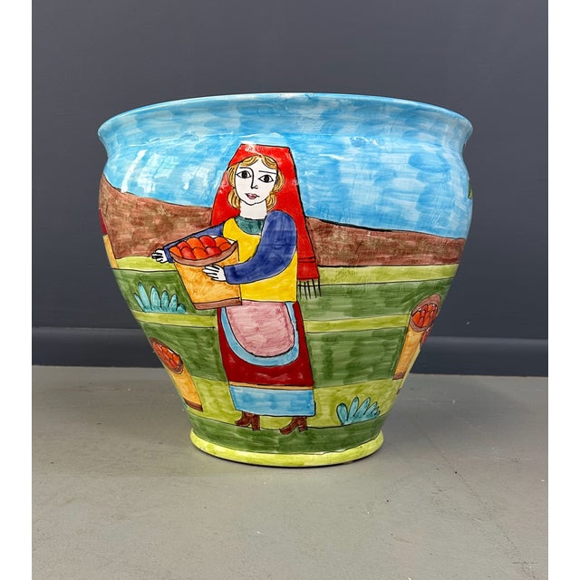 This 1990s Nino Parrucca Large Ceramic Planter is a vibrant addition to any home or garden. Handmade with vivid colors...