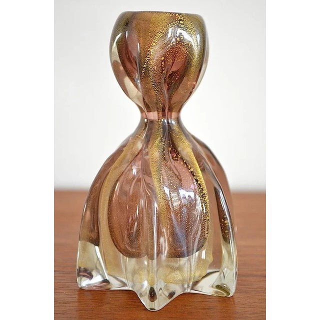 Very nice Mid-Century Murano candle stand of the Italian Muranoglas Manufaktur Barovier & Toso. The candle light is...