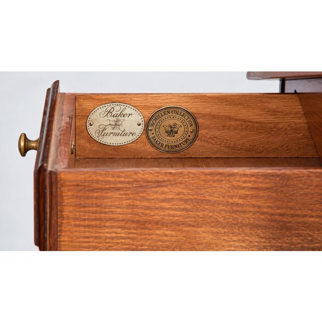 This is a late 20th century Baker Furniture McMillen Collection mahogany and leather bookstand or etagere shelf. It is...