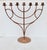 Modern Menorah in the Arts and Crafts style. Fine large format for large candles and focal point. Wide stand with...