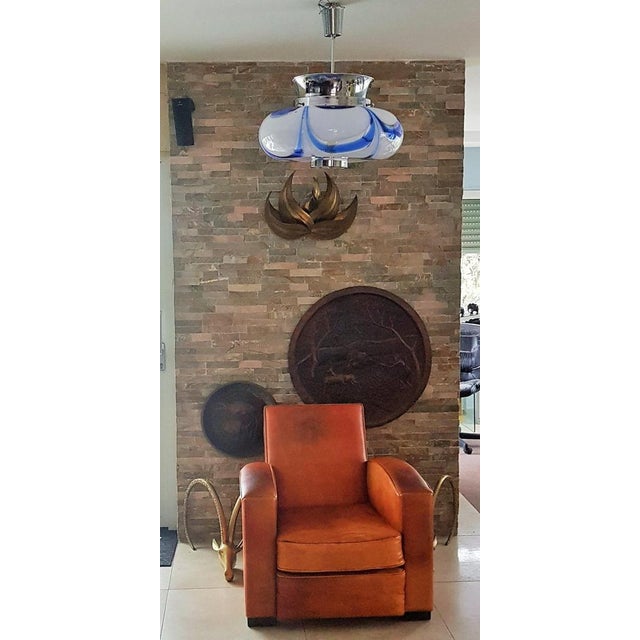 Mid Century Mazzega hanging lamp made of blue glass and chrome, Italy in the 1960s. Large size, unusual color. A light...