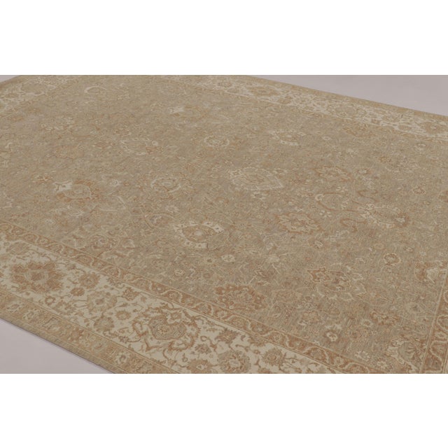 Hand-knotted in wool, this 9x12 rug is a masterful addition to Rug & Kilim’s Modern Classics Collection, inspired by the...