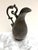 Vintage pewter metal curvy pitcher or flower vase for any occasion or decor. Ornate detailed handle and curvy base make...