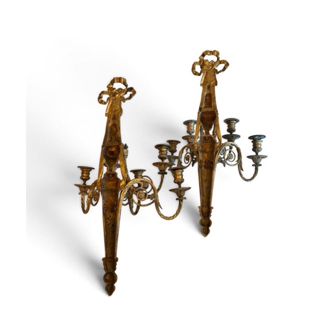 Pair of antique 19th c Gilt Bronze five arm Wall Sconces. Louis XVI Neoclassical design, topped by ribbon bow and very...