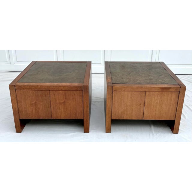 Here is a pair of fantastic, chunky wood side table in the style (and in my mind attributed to) Milo Baughman. The tables...