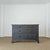 Dimensions: 54.25"W x 21"D x 36.25"H A beautifully timeworn English pine chest, finished in a rich ebonized and waxed...