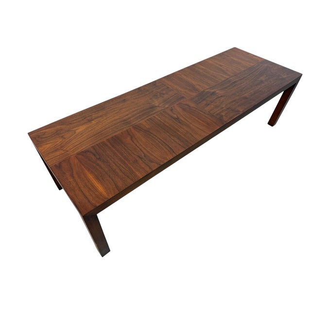 Elevate your living space with this stunning 1960s Mid-Century Modern walnut coffee table by Lane Furniture. Featuring a...