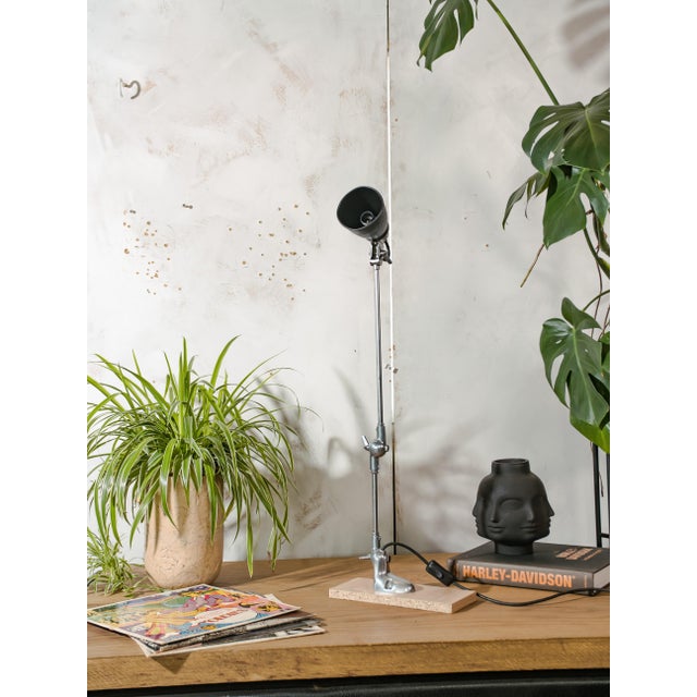 A 1950s two-arm articulated sewing machine lamp by pfaff, restored for use as a table or wall light. pfaff was founded in...
