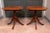 Large tables on elegant black trimmed pedestal bases with geometric marquetry inlays on the tops. Quality American...