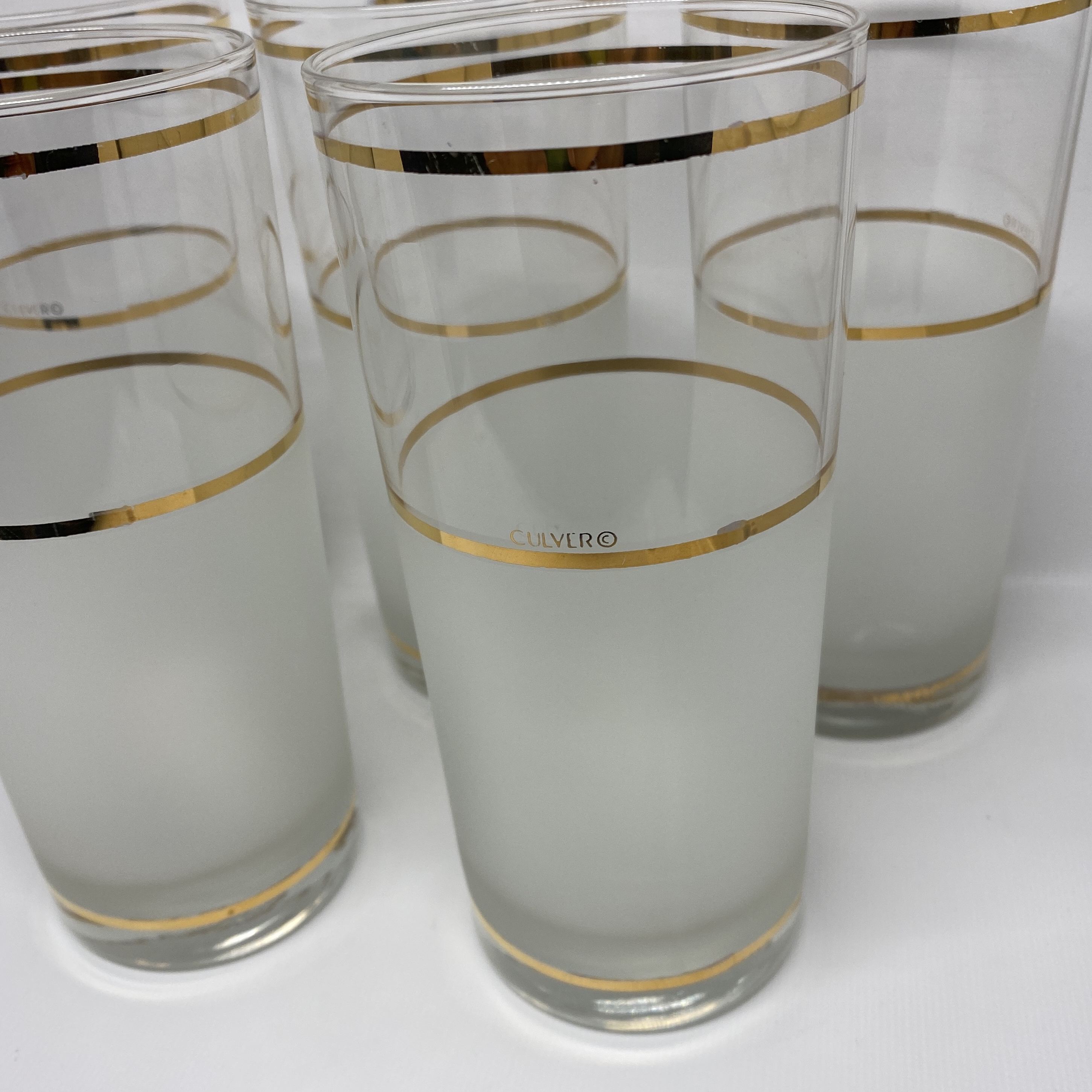 clear glasses with gold trim