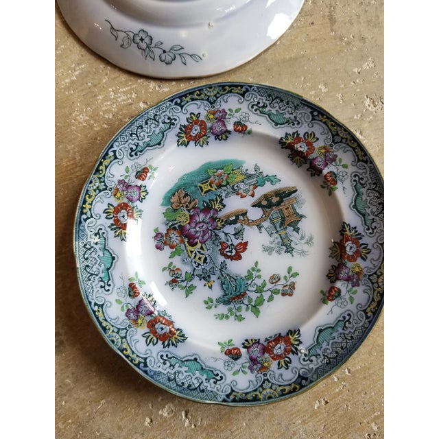 Six salad plates or dessert plates with a combination of transferware and hand painted accents...natural original flaws in...