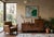 A beautifully restored Art Deco sideboard in rich walnut. This piece features a distinct asymmetrical stepped silhouette,...