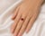 Stunning 14K yellow gold fashion ring featuring a natural odd-shaped ruby surrounded by brilliant round diamonds. Estate...