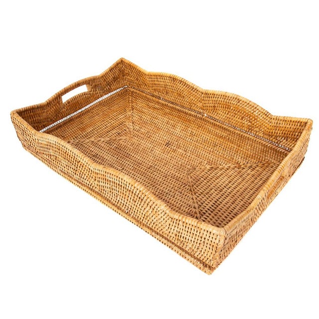 Our Scallop Collection rattan storage baskets, serving trays, and ottoman trays will instantly add a gorgeous touch to any...