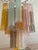 Set of 3 three eclectic murano chandeliers. Tubular formed glass prisms in traditional italian mid-century style, produced...