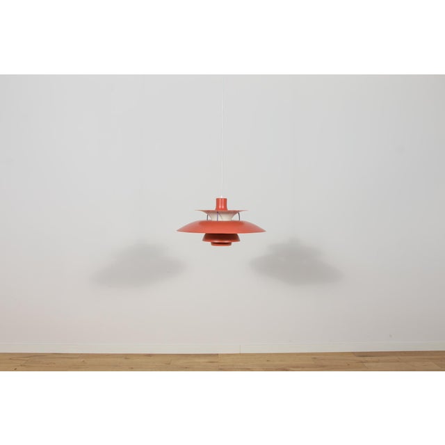 This ph 5 pendant lamp was designed by poul henningsen for the danish lighting manufacturer louis poulsen. The model was...