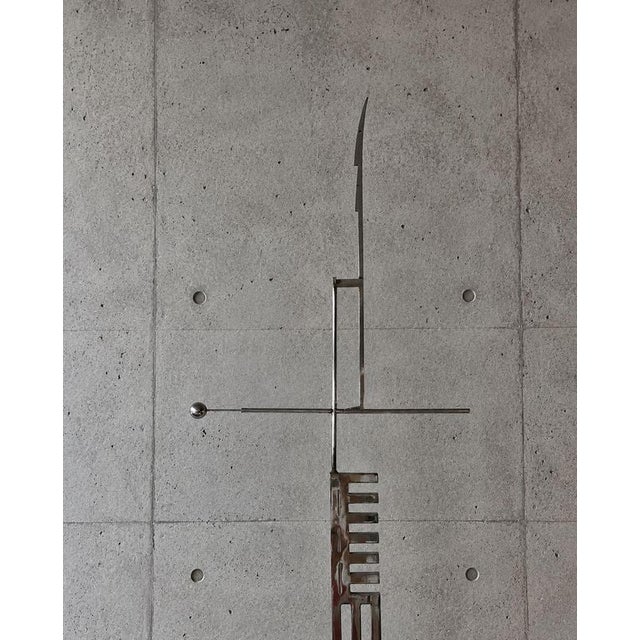 Designer/artist unknown France 1970s H 275cm (approxamately) W 65cm Striking large-scale chrome kinetic wind catcher ,...