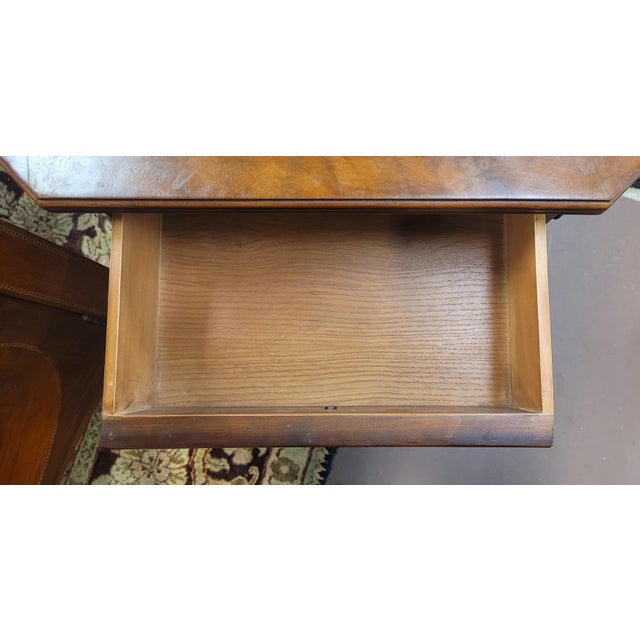 Fine 1940s- 50s vintage lrather top center table. Features hexagonal form with 4 clean drawers, brass feet and cators,...