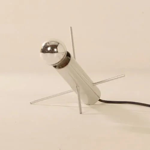 Raak cricket model r-60 designed by otto wasch for raak in 1962. One rod, two pins, one bulb… could it be simpler! by...