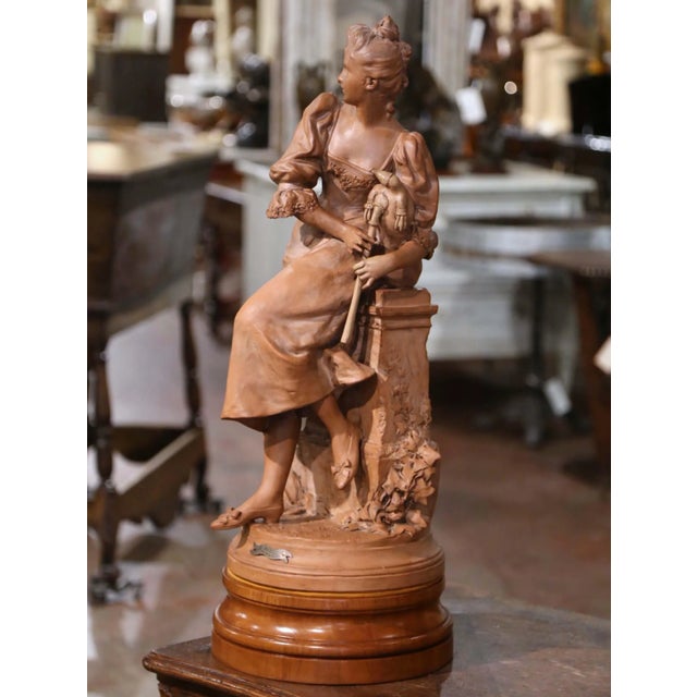 Bring a sense of elegance and movement to a study, music room, or refined living space with this exceptional antique...