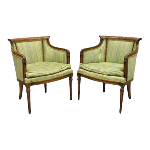 Early 1900s Antique Italian Regency Distressed Carved Walnut Barrel Back Club Chairs - Pair