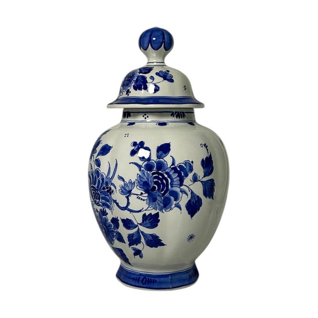 Vintage hand-painted royal delft / de porceleyne fles lidded vase from 1972, decorated in delft blue with rich floral...