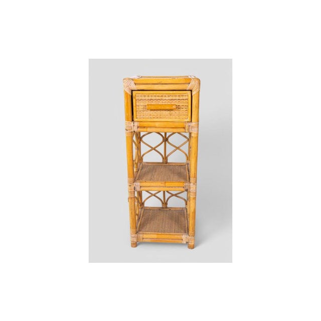 This charming vintage rattan cabinet from the 1960s/70s perfectly embodies the natural, airy aesthetic typical of boho and...