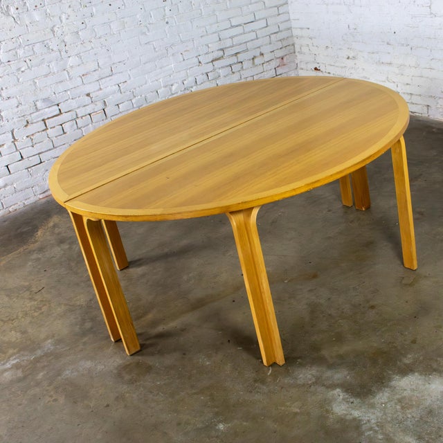 Marvelous vintage Scandinavian Modern oak dining, conference, or 2 demi lune console tables designed by Rud Thygesen and...