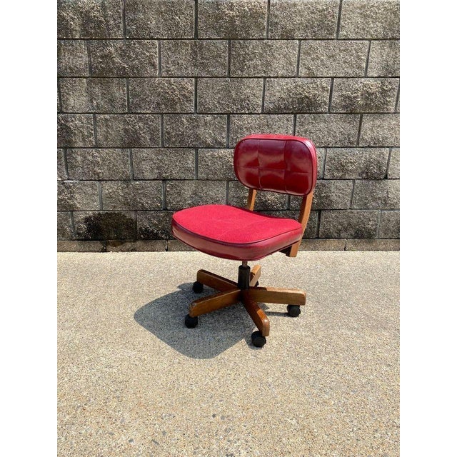 Mid-Century Modern office task chair casters on an extremely heavy wood base, rolls smoothly. with adjustable height and...
