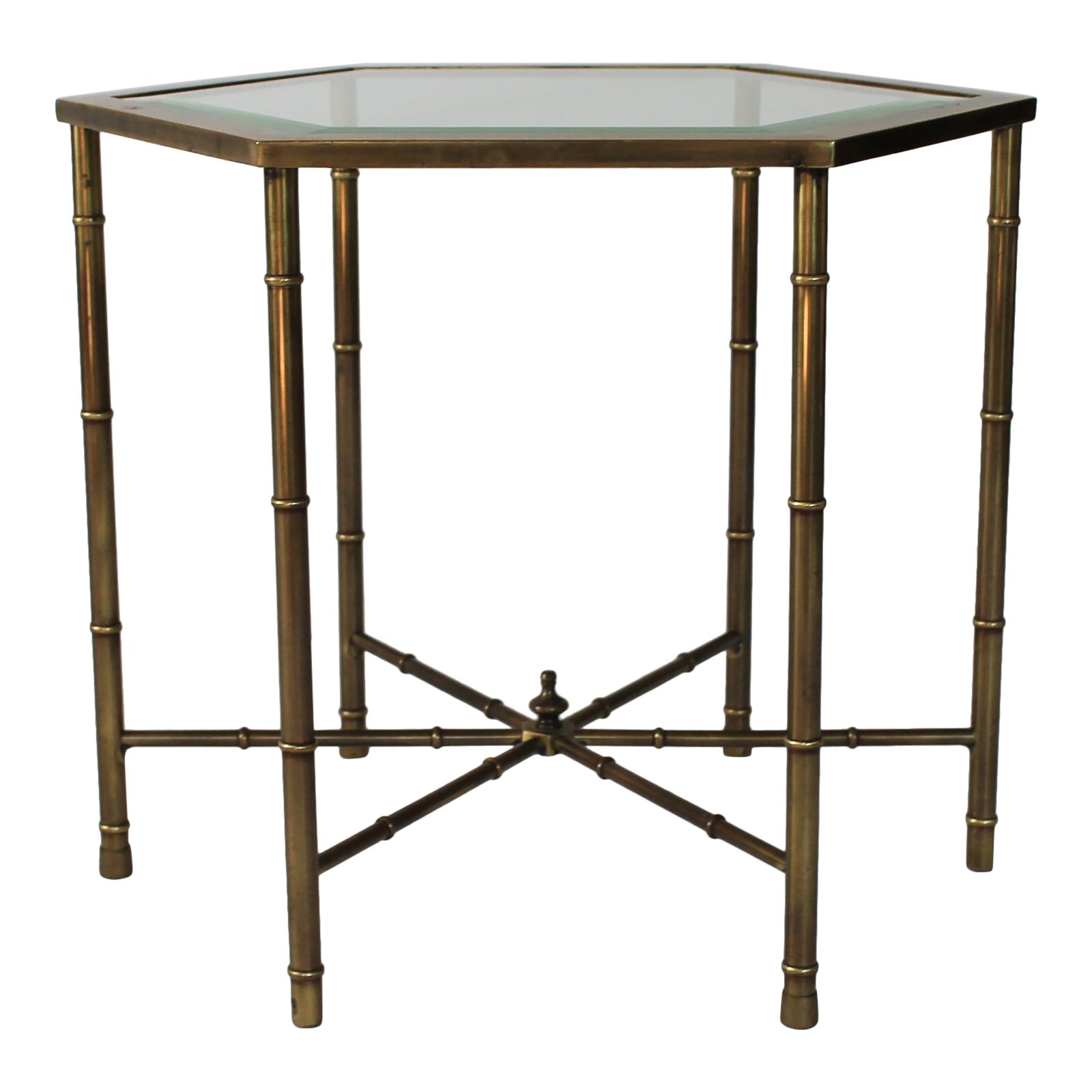 Brass metal-legged glass top table with X-frame