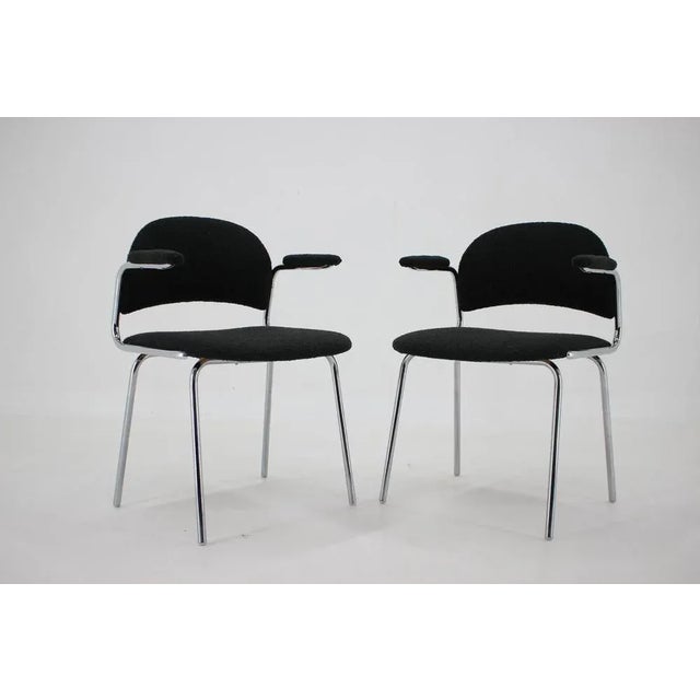 Newly upholstered. Height of seat 45 cm.