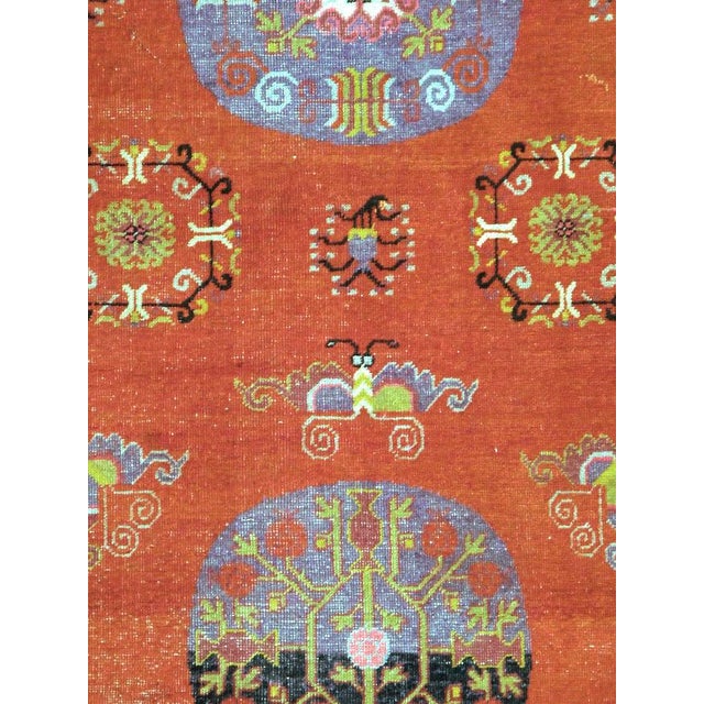 Antique Khotan rugs and carpets were produced in the oasis town of Eastern Turkestan, today part of the Xinjiang region in...
